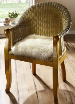 BADER Merino-Lammfell-Sitzauflage in Tierform BEIGE