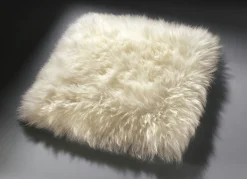 BADER Merino-Lammfell-Sitzauflage in Tierform BEIGE